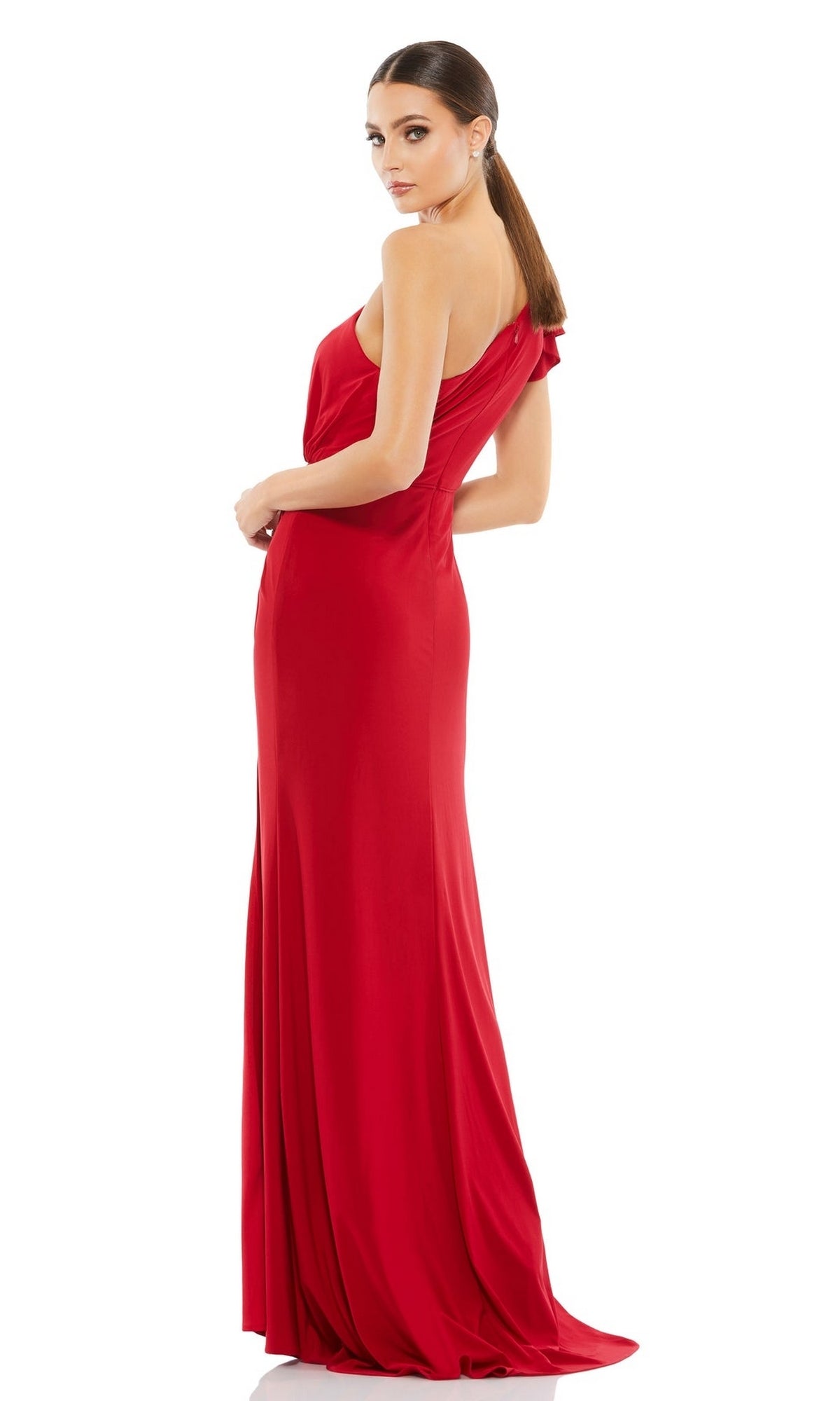 Woman wearing the Long Formal Dress 67858 by Mac Duggal, a red, floor-length, one-shoulder gown, posing in three-quarter view against a plain white background.